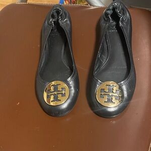 Tory Burch Black Flats with Gold Emblem